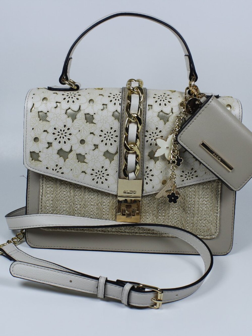 Aldo Beige Satchel Bag with Laser-Cut Floral Flap and Gold Chain